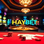 Experience the excitement of HAYBET at an elegant casino table with poker chips and cards.